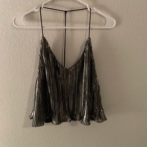 Backless revolve top